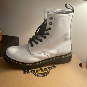 Dr. Martens white combat boots. Matte and slight platform. Never been worn!